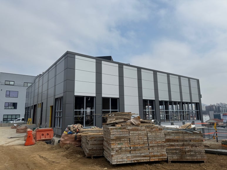 Glass-wool Sandwich Panel line